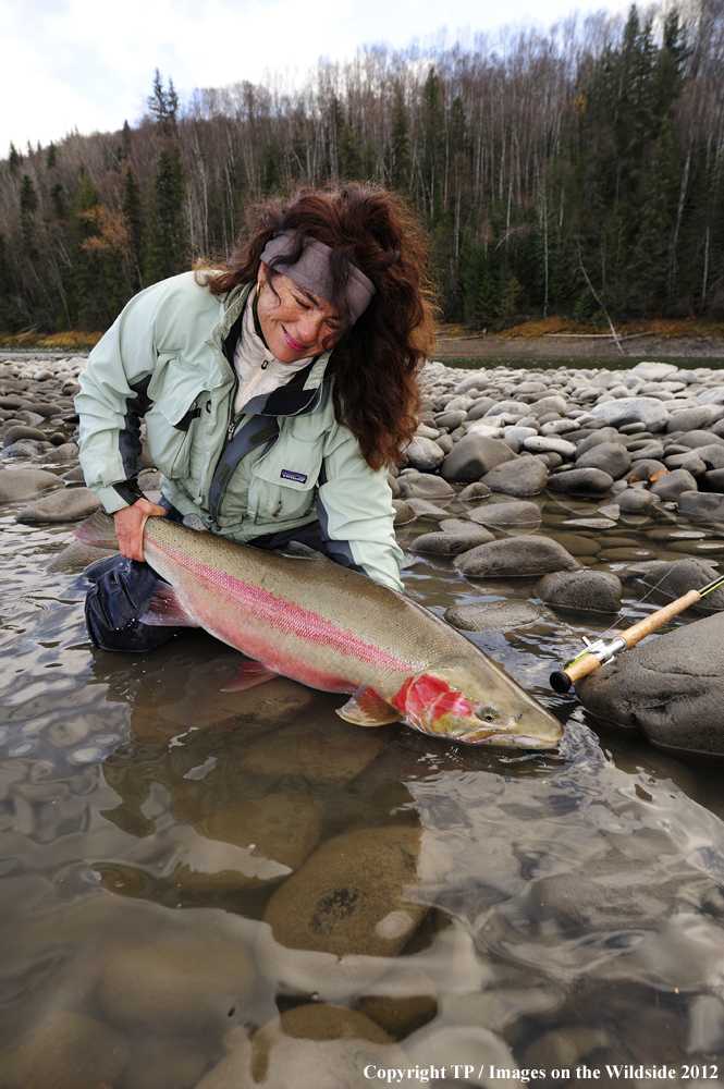 Fisherwoman with Steelhead Trout. 