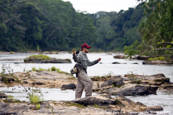 Flyfisherman on river 