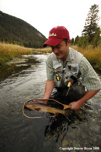 Flyfisherman with Cutthroat Trout