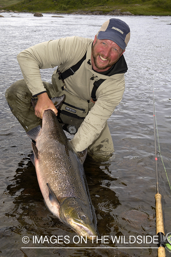 Flyfisherman with salmon.