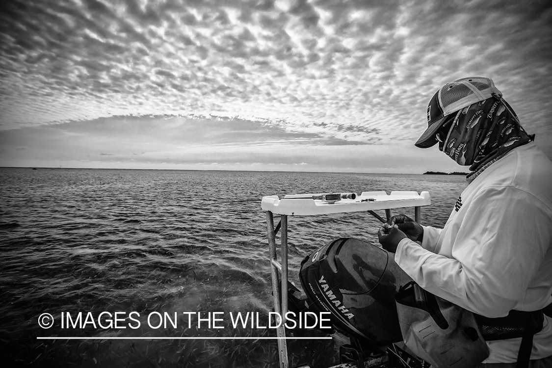 Flyfisherman choosing fly.