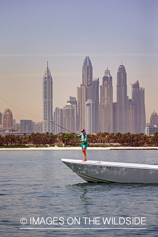 Flyfishing for queenfish off the coast of Dubai, UAE.