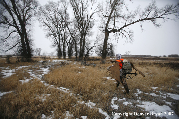 Moose hunter in field