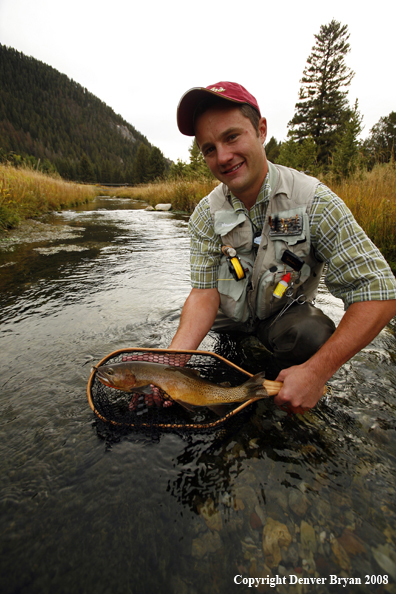 Flyfisherman with Cutthroat Trout