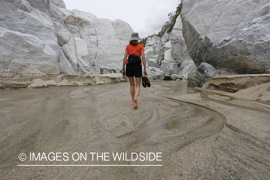 Woman exploring an arroyo in Baja Peninsula, Mexico.