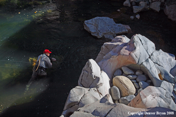 Flyfisherman in Slot Canyon Stream