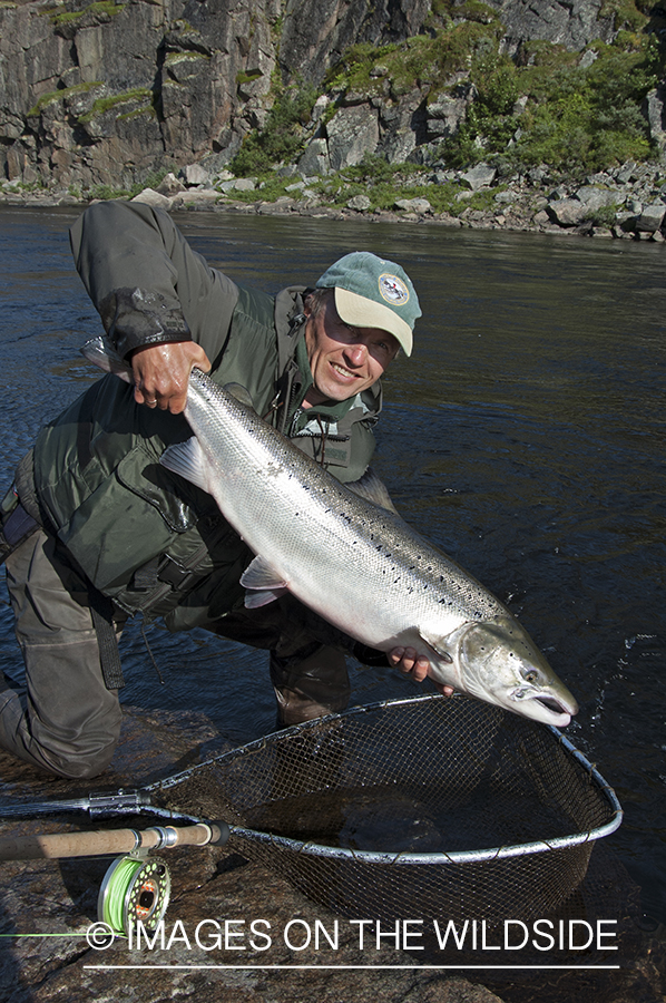 Flyfisherman with salmon.