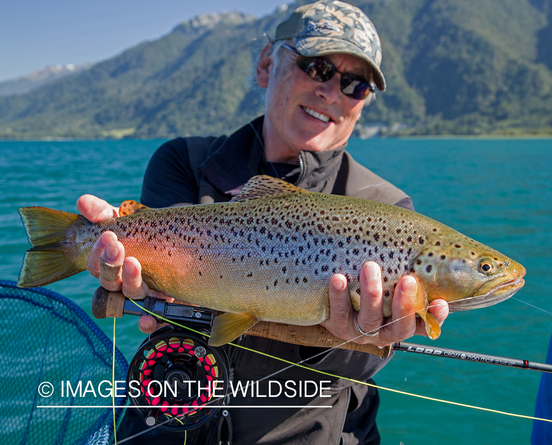 Flyfisherman with rainbow trout.