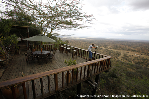 Family watching wildlife on african safari