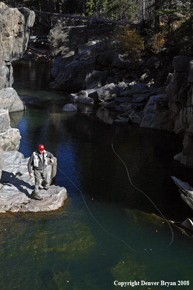 Flyfisherman Casting in Slot Canyon