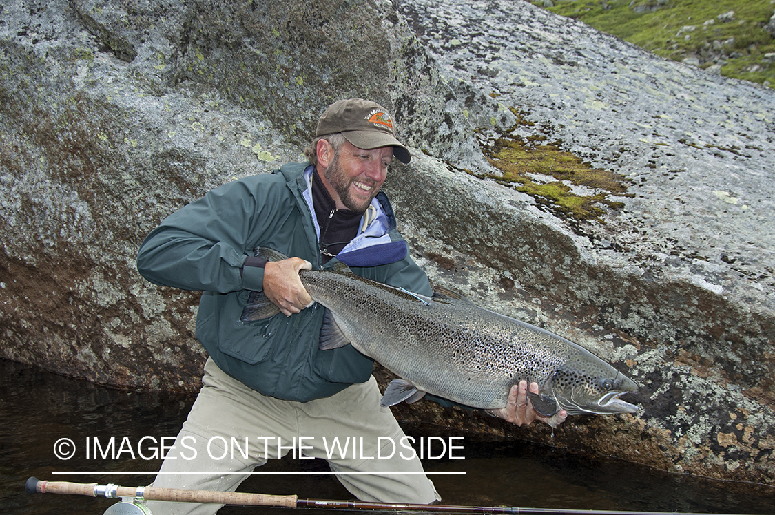 Flyfisherman with salmon.