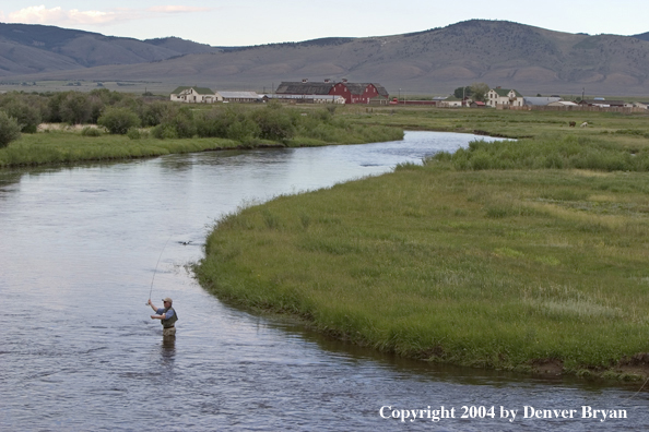 Flyfisherman on river.