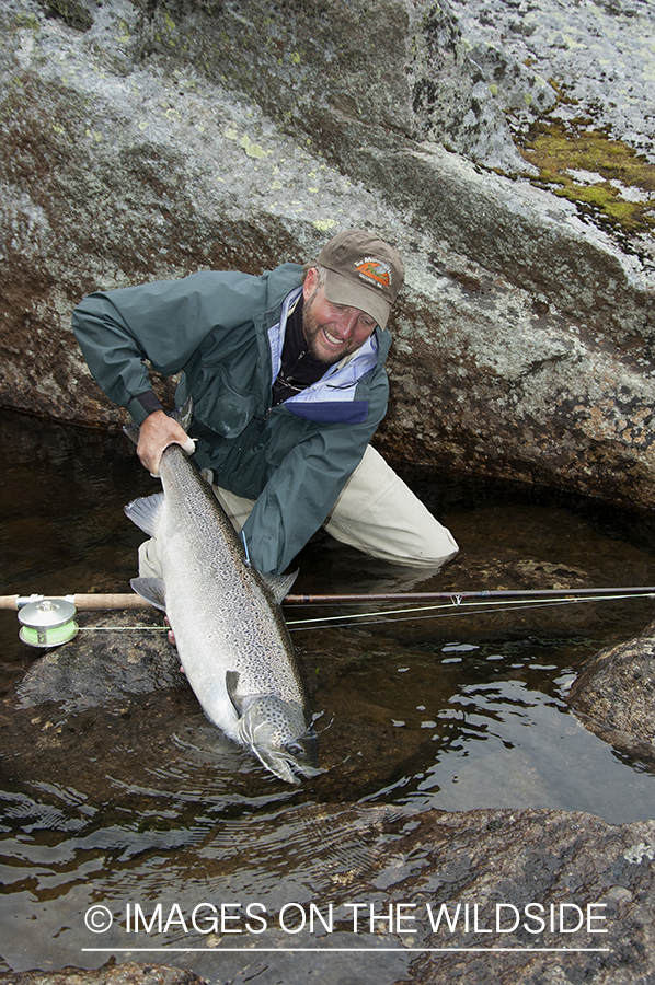 Flyfisherman with salmon.