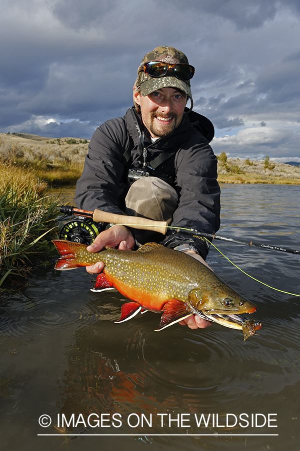 Flyfisherman with a brook trout.