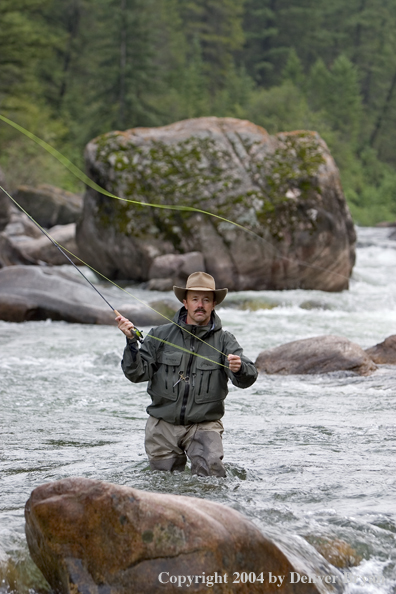 Flyfisherman pocket fishing on stream.