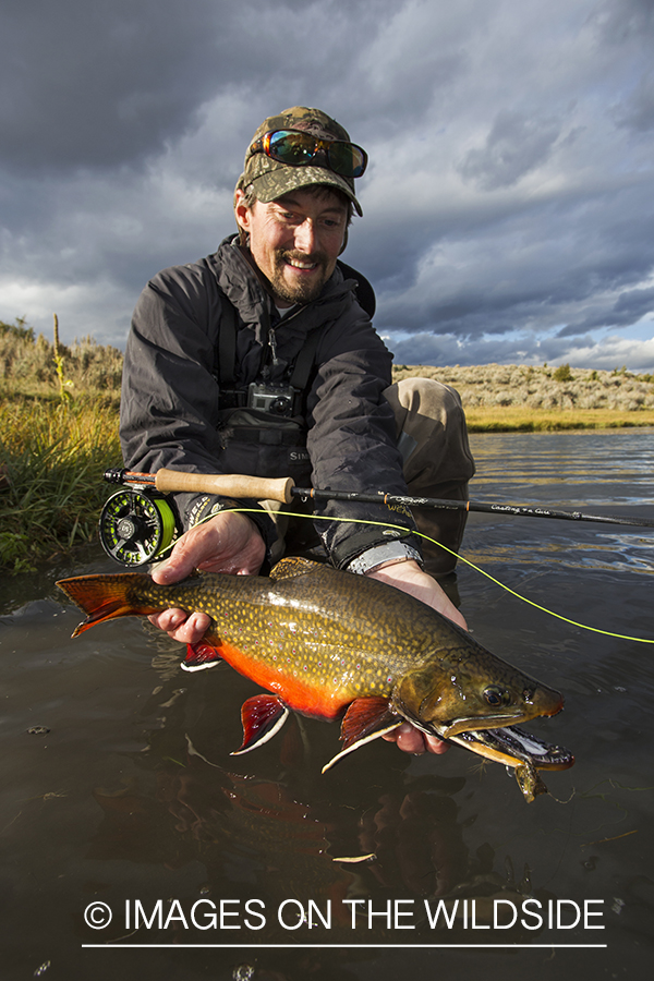 Flyfisherman with a brook trout.