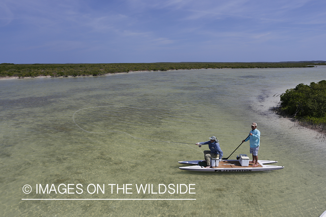 Saltwater flyfishermen on stand up paddle boards.