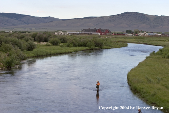 Flyfishermen on river.