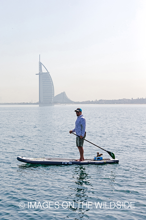 Flyfishing for queenfish off the coast of Dubai, UAE.