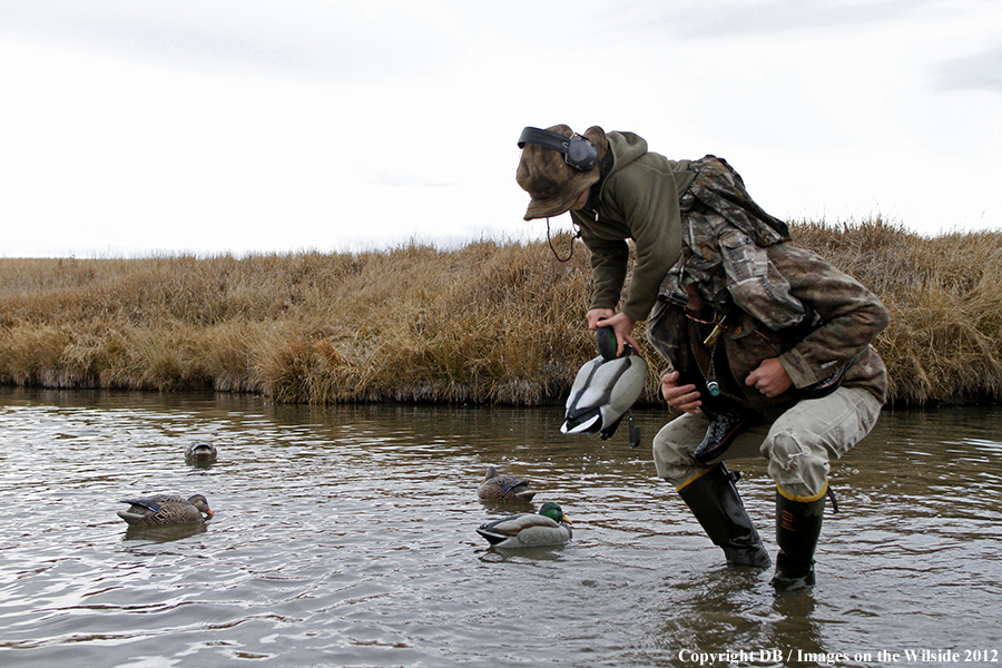 Father and son hunting waterfowl.