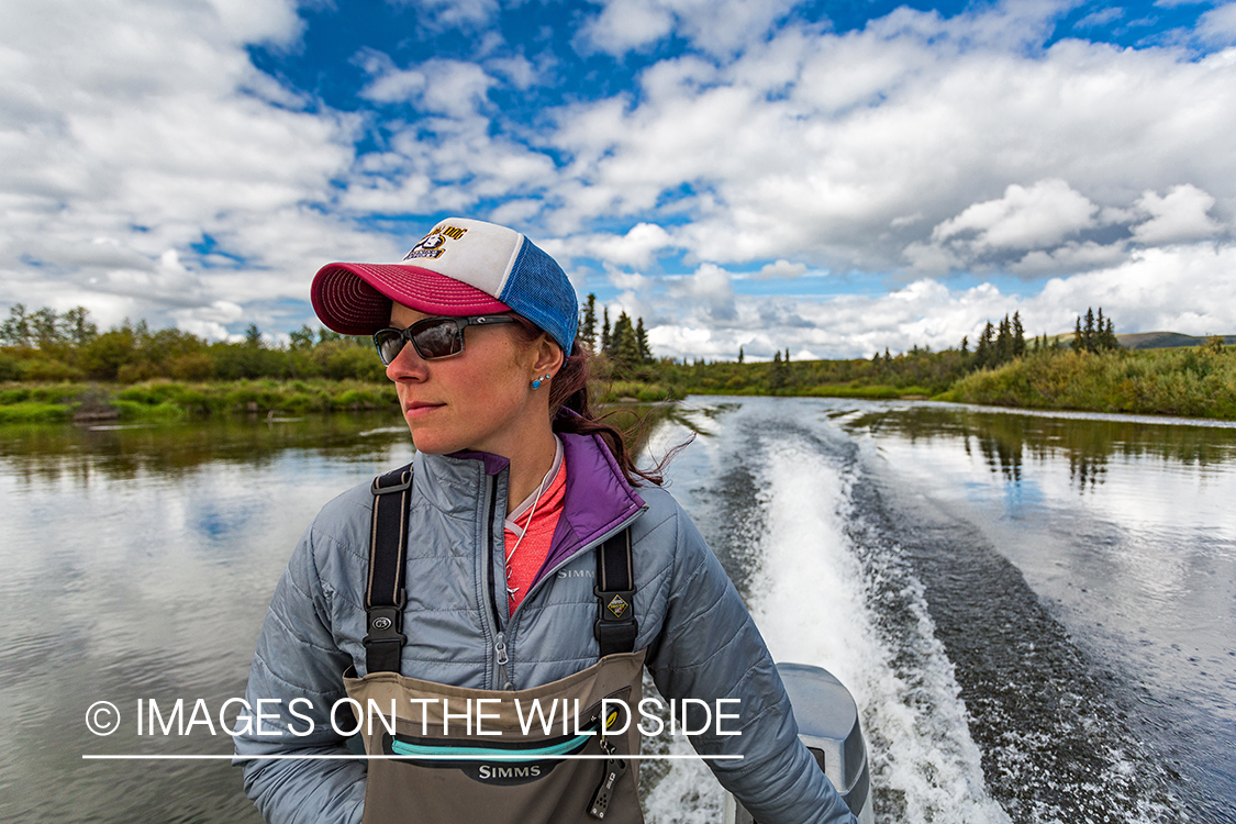 Flyfishing guide Camille Egdorf driving jetboat.