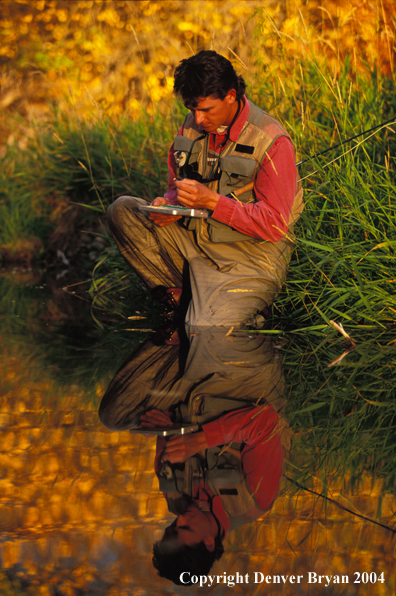 Flyfisherman choosing flies.