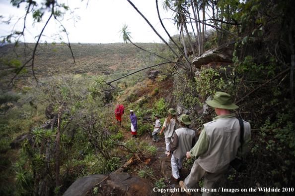 family hiking on african safari