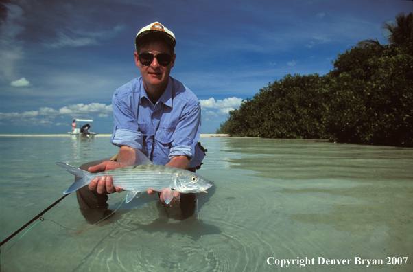 Saltwater flyfisherman holding bonefish.