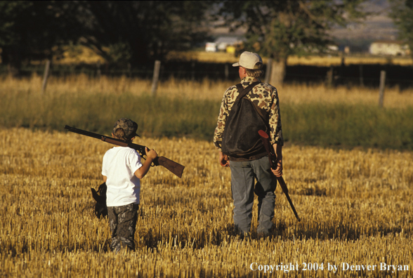 Father and son upland bird hunting.