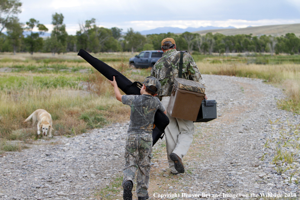 Father and Son packing up after a day of Dove Hunting