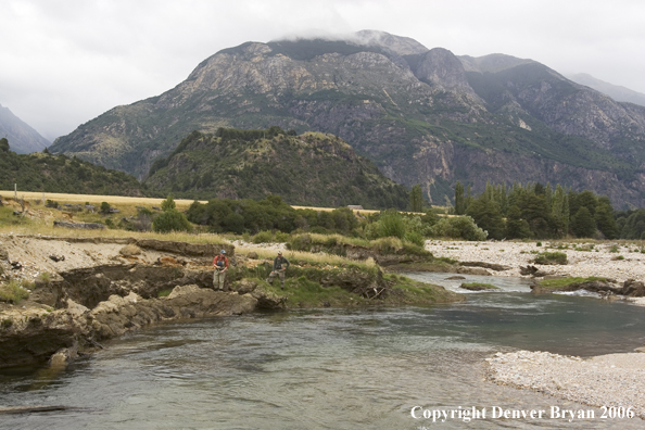 Fisherman casting on river.