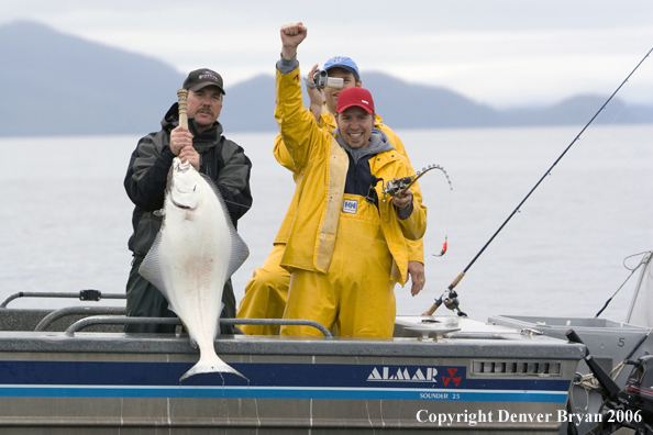 Fishermen with halibut catch.  (Alaska/Canada)