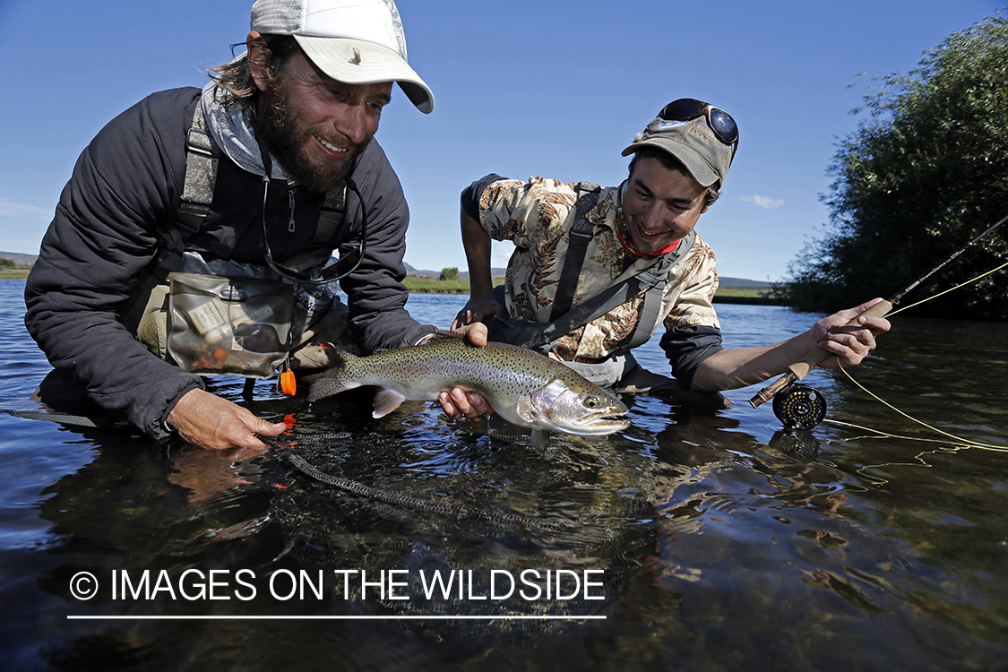 Flyfishermen with rainbow trout.