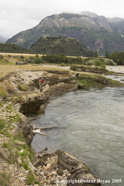 Flyfisherman casting on river.