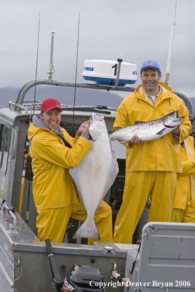 Fishermen with halibut and salmon catch.  (Alaska/Canada)