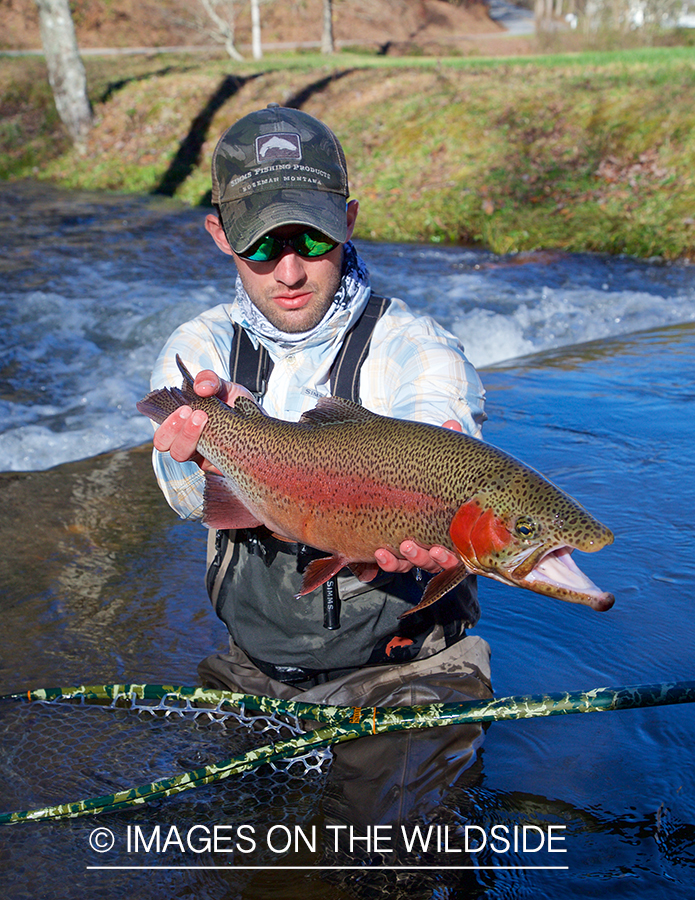 Flyfisherman with rainbow trout.