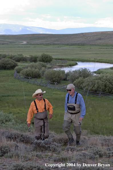 Flyfishermen walking back from river (MR)