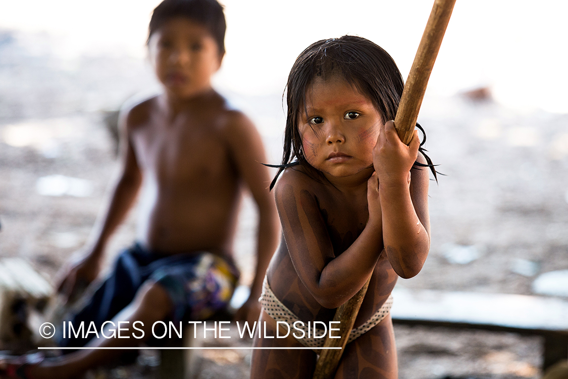 Native children along river in Kendjam region, Brazil.