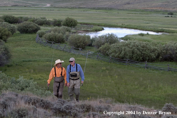 Flyfishermen walking back from river (MR)