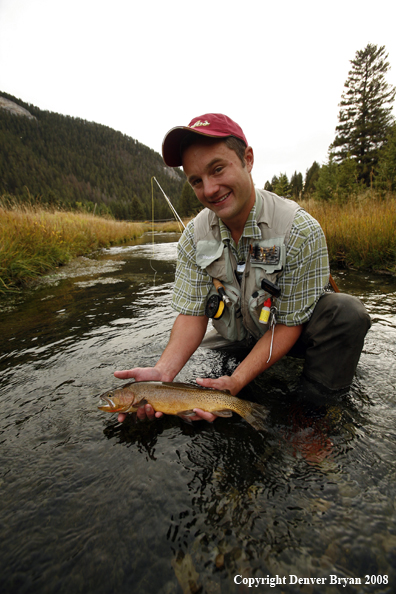 Flyfisherman with Cutthroat Trout