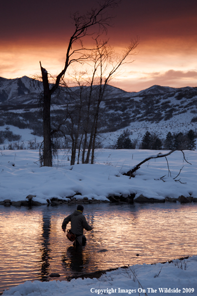 Flyfisherman on river.