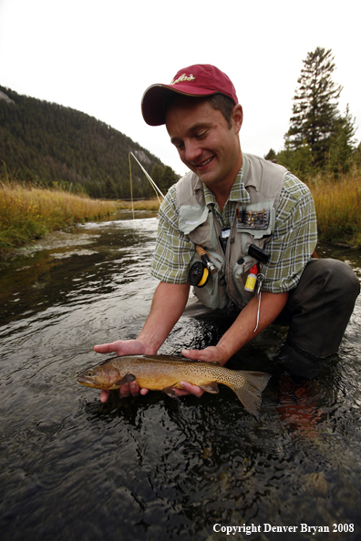 Flyfisherman with Cutthroat Trout