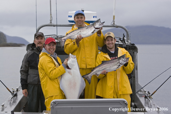 Fishermen with halibut and salmon catch.  (Alaska/Canada)