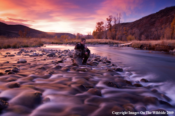 Flyfisherman on river.