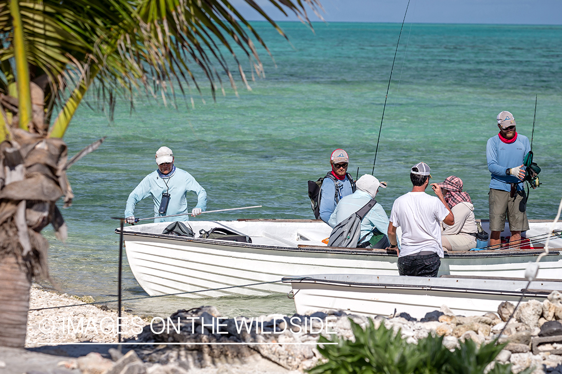 Flyfisherman in boats on St. Brandon's Atoll flats, Indian Ocean.