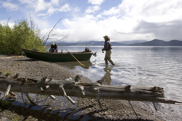 Flyfisherman on lake shore.