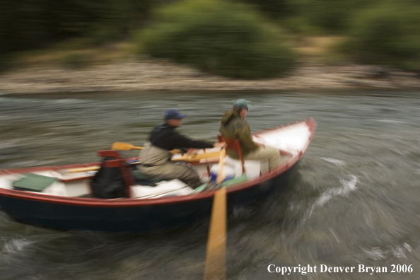 Flyfisherman in driftboat.