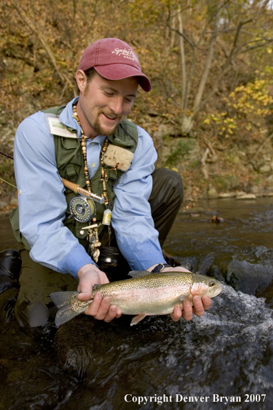 Flyfishermen with nice rainbow trout