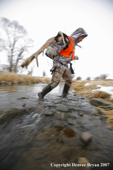 Moose hunter in field