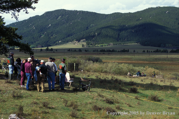 Hunters and spectators at field trial